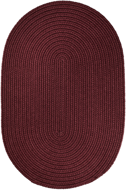 Solid Poly Burgundy braided indoor/outdoor rug by Rhody Rug — oval