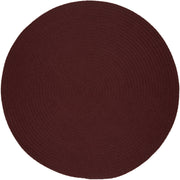 Solid Poly Burgundy braided indoor/outdoor rug by Rhody Rug — round